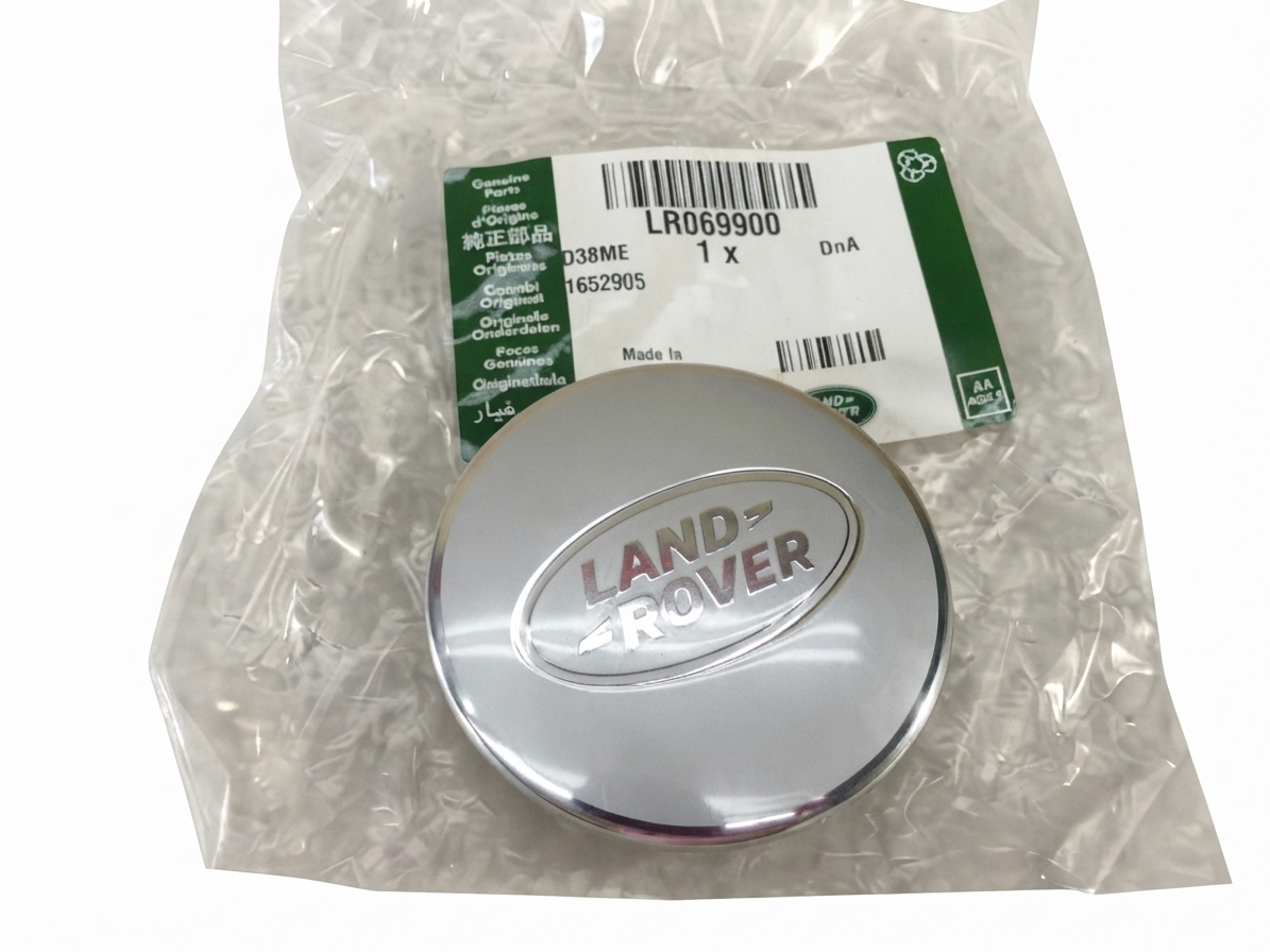 LR069900 COPRIMOZZO RUOTA ORIGINALE LAND ROVER COLORE ARGENTO NUOVO